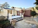 Brick house with deck, patio, and fenced backyard at 201 Center St, Walterboro, SC 29488