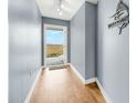Bright hallway with access to balcony and water views at 2395 Folly Road Rd # 4F, Folly Beach, SC 29439
