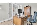 Home office with built-in wooden desk and chair at 119 Leeward Lndg, Summerville, SC 29486