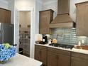 Modern kitchen with walk-in pantry and stainless steel appliances at 320 Trailmore Ln, Summerville, SC 29486