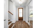 Bright entryway with hardwood floors and staircase at 467 Eagleview Drive, Moncks Corner, SC 29461