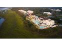 Aerial view of coastal community with marsh views and resort-style pool at 9005 Stern Aly, Johns Island, SC 29455