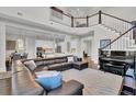 Spacious living room with a large sectional sofa and piano at 1615 Paradise Lake Dr, Mount Pleasant, SC 29464
