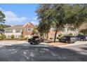 Brick building with cars parked in front and trees around at 1728 Wyngate Cir, Mount Pleasant, SC 29466