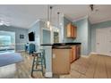 Open kitchen with island and stainless steel appliances at 1984 Folly Rd # B214, Charleston, SC 29412