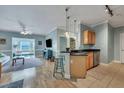 Open kitchen with island and stainless steel appliances at 1984 Folly Rd # B214, Charleston, SC 29412