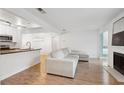 Bright living room with light colored sectional sofa and fireplace at 265 Alexandra Dr # 10, Mount Pleasant, SC 29464