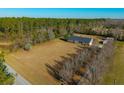 Ranch home on large lot with mature trees and detached garage at 534 Farmers Market Rd, Saint George, SC 29477