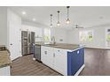 Modern kitchen with stainless steel appliances and an island at 1040 Wading Point Blvd, Huger, SC 29450