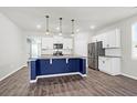 Modern kitchen with stainless steel appliances and an island at 1040 Wading Point Blvd, Huger, SC 29450