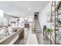 Open concept living space with hardwood floors and stylish furnishings at 240 Godwit Dr, Summerville, SC 29486