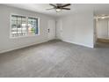Spacious living room with neutral carpeting and lots of natural light at 3 Tommy Cir, Goose Creek, SC 29445