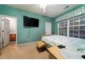 Bedroom with a TV, queen bed, and access to a private bathroom at 3001 Parkwest Boulevard, Mount Pleasant, SC 29466