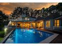 Inviting pool and deck area with stunning sunset views at 6124 Rudder Ln, Awendaw, SC 29429