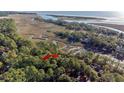 Aerial view showing home's location near water at 2942 Seabrook Island Rd, Seabrook Island, SC 29455