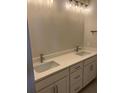 Double vanity bathroom with quartz countertops and modern fixtures at 3005 Harvey Ave, North Charleston, SC 29405