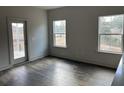 Spacious living area with hardwood floors and plenty of natural light at 3005 Harvey Ave, North Charleston, SC 29405