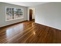 Bright living room featuring hardwood floors and large windows at 105 Gambels Ln, Summerville, SC 29485