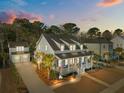 Stunning aerial view of a charming two-story home with a detached garage at 1843 Bolden Dr, Mount Pleasant, SC 29466