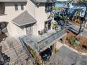 Elevated view of townhome showcasing its private deck and surrounding landscape at 1915 Marsh Oak Ln, Seabrook Island, SC 29455