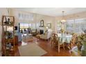 Bright and airy living room with hardwood floors, vaulted ceiling and water views at 1915 Marsh Oak Ln, Seabrook Island, SC 29455