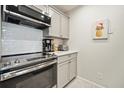 Stainless steel appliances and white shaker cabinets at 2262 Folly Rd # 2-K, Charleston, SC 29412