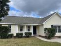 Ranch style home with covered porch and landscaped yard at 232 Mallory Dr, Charleston, SC 29414