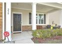 Front porch with seating area and stone accents at 238 Wathen Dr, Goose Creek, SC 29445