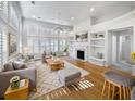 Spacious living room with hardwood floors and a fireplace at 606 Pointe Of Oaks Rd, Summerville, SC 29485