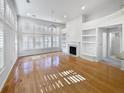 Bright living room featuring hardwood floors and abundant natural light at 606 Pointe Of Oaks Rd, Summerville, SC 29485