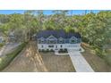 Aerial view of house, yard, and driveway at 970 Lansing Dr, Mount Pleasant, SC 29464