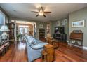 Spacious living room with hardwood floors and large windows at 104 Pavilion St, Summerville, SC 29483