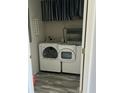 Laundry room with washer and dryer, and wood-look flooring at 214 Hardee Ave Ave, Summerville, SC 29485