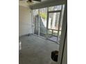 Screened porch with a view of the backyard and surrounding trees at 214 Hardee Ave Ave, Summerville, SC 29485