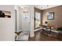 Bright entryway with a view into the kitchen and breakfast nook at 487 Switchgrass Dr, Summerville, SC 29486