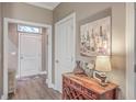 Bright entryway with storage and wood console table at 8382 Camp Gregg Ln, North Charleston, SC 29418