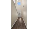 Bright entryway with hardwood floors and staircase at 241 Swamp Creek Ln, Moncks Corner, SC 29461