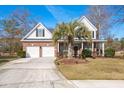 Two story house with driveway and palm tree at 105 Tyne Ct, Goose Creek, SC 29445