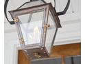 Close-up of an ornate gas-lit exterior lantern at 1245 Crooked Oak Rd, Charleston, SC 29492