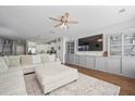 Spacious living area with a large sectional sofa and built-in shelving at 152 Callibluff Dr, Summerville, SC 29486