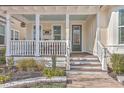Inviting front porch with white railings, creating a relaxing outdoor space at 216 Bumble Way, Summerville, SC 29485