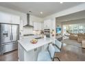 Modern kitchen featuring white cabinets, stainless steel appliances, and an island at 2910 Clearwater Dr, Mount Pleasant, SC 29466