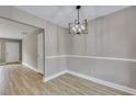 Bright dining area with modern chandelier and wainscoting at 519 Travelers Blvd, Summerville, SC 29485
