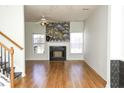 Living room featuring hardwood floors and a fireplace at 547 Pleasant Side Dr, Moncks Corner, SC 29461