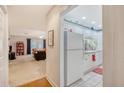 Small kitchen with white cabinets and granite at 9117 Woodcreek Ct, North Charleston, SC 29406