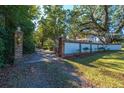 Brick entry gate and wall leading to home at 927 Fishburne Rd, Pinopolis, SC 29469