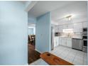 Bright kitchen with stainless steel appliances and light blue walls at 1101 Reserve Way, Summerville, SC 29485