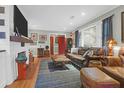 Fireplace,leather furniture,and built-in shelving at 1159 Wyndham Rd, Charleston, SC 29412