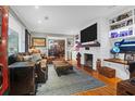 Cozy living room with a fireplace and leather furniture at 1159 Wyndham Rd, Charleston, SC 29412