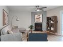 Living Room with fireplace and wood-look floors at 1202 Waterwood Dr, Goose Creek, SC 29445